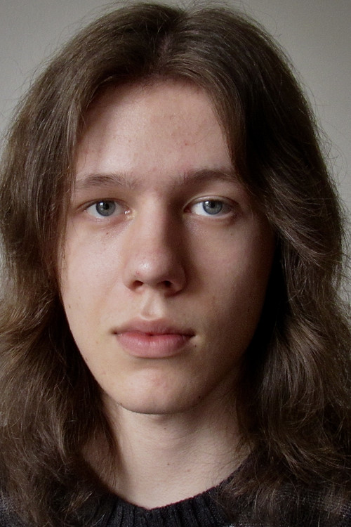 Dylan Peters as The Worker