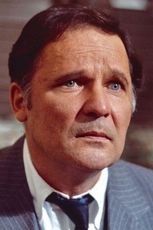 John Vernon as Fred Wares