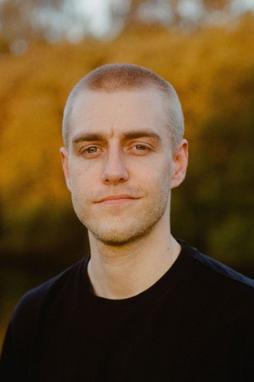 Frazer Bull-Clark as Hotel Receptionist