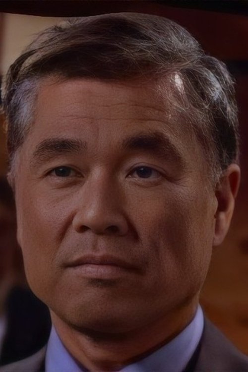 Jim Ishida as Coroner