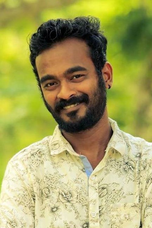 Sarath Kumar as Rajesh