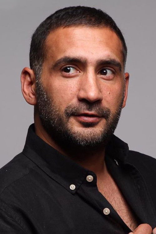 Ümit Karan as 