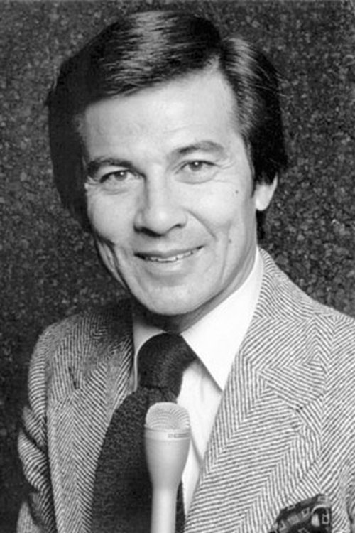 Mario Machado as TV Newscaster