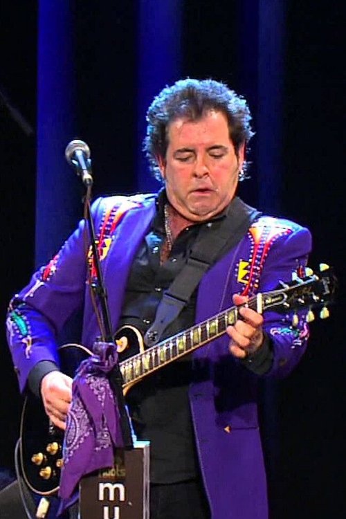 Billy Burnette as Travis