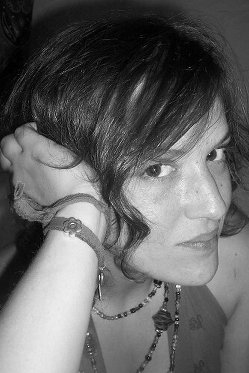 Sabrina Assabah as Woman in cabin