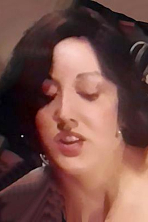 Carol Harper as Paula