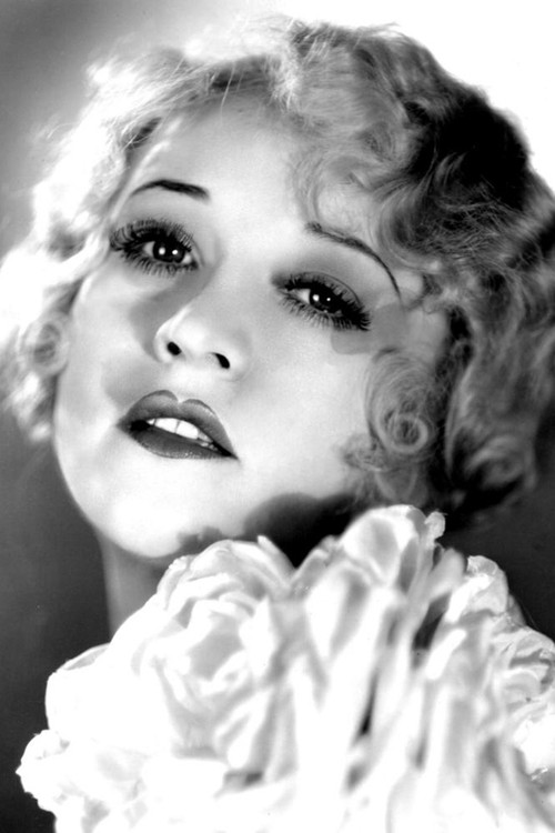 Betty Compson as Mae