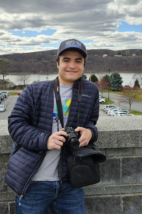 Jacob DiNobile as Voices (voice)