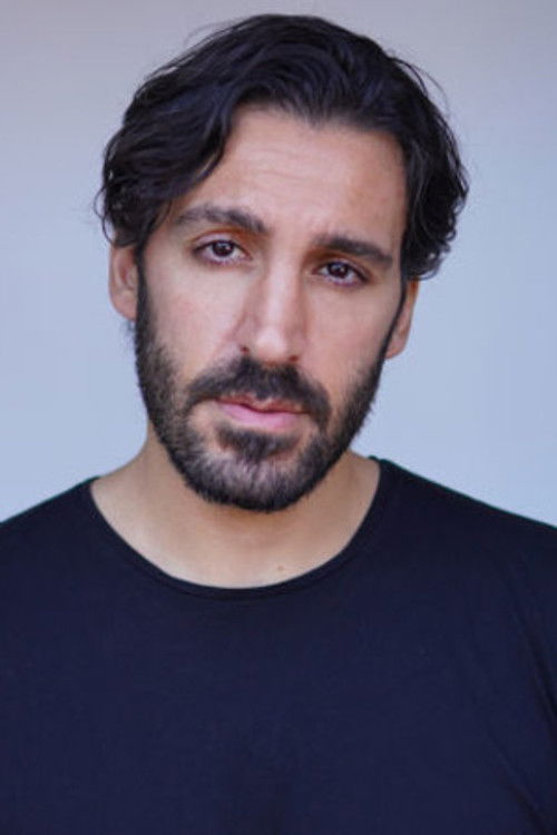 Johni Tadi as Mysterious Man