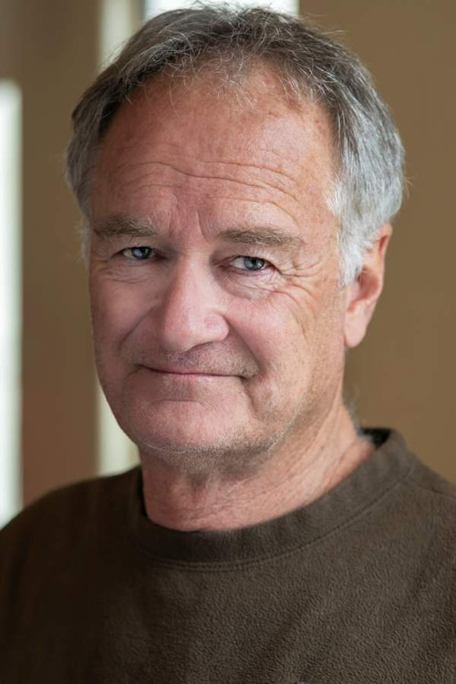 John Chalmers as Doctor