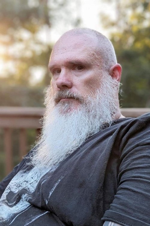 David Moore as Barbecue Guest /Newspaper Neighbor