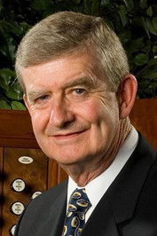 John Longhurst as Organist