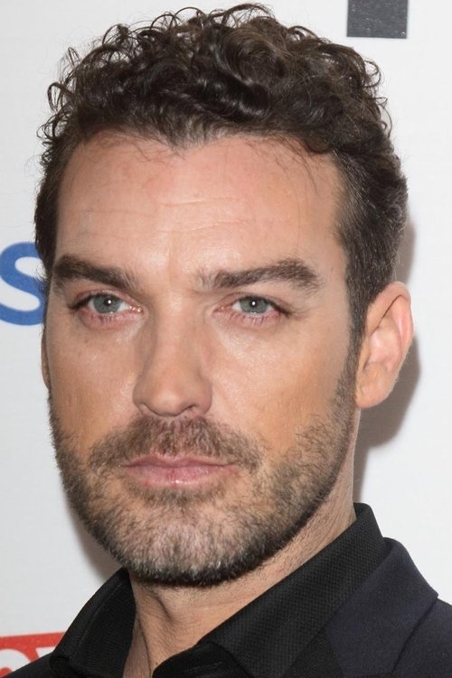 Jake Maskall as Adrian