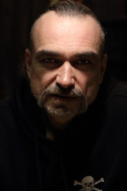 Erec O. Kozàr as Beggar