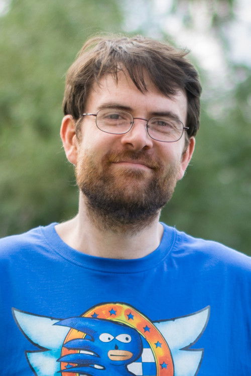 Frédéric Molas as Vendeur du magasin de jeu rétro