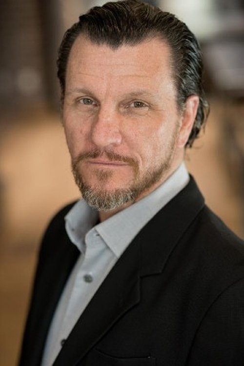 David Atkinson as Tom