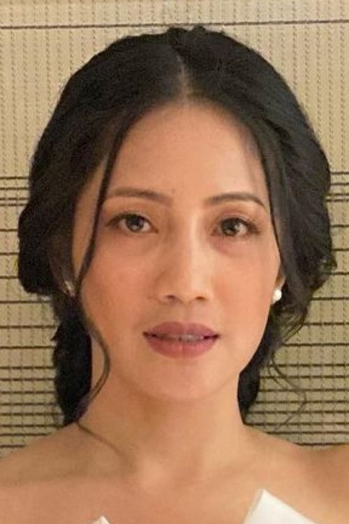 Rosmala Sari Dewi as Mask Dancer