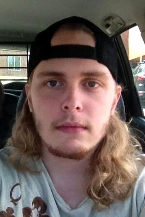 Holden McNeil as Video Store Clerk