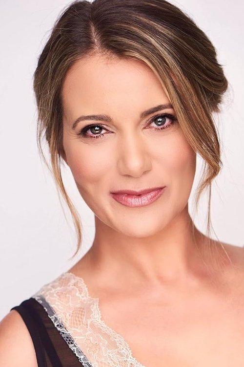 Caroline Amiguet as The Madam