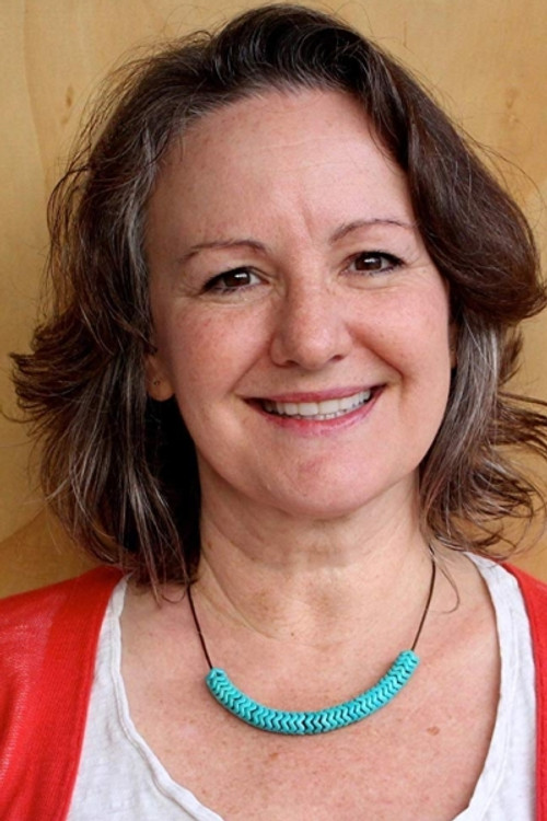 Betsy Foldes as Super John Doe's Wife (voice)