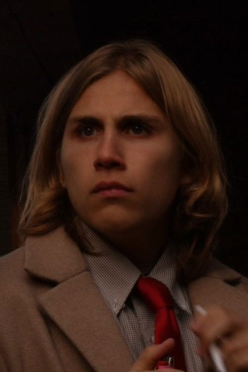 Émile Kételers as Malcolm