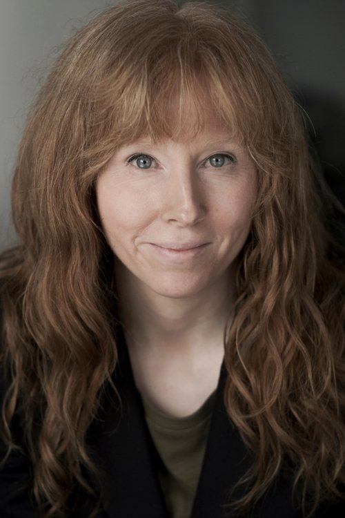 Sophie Lund as Newsreader #3