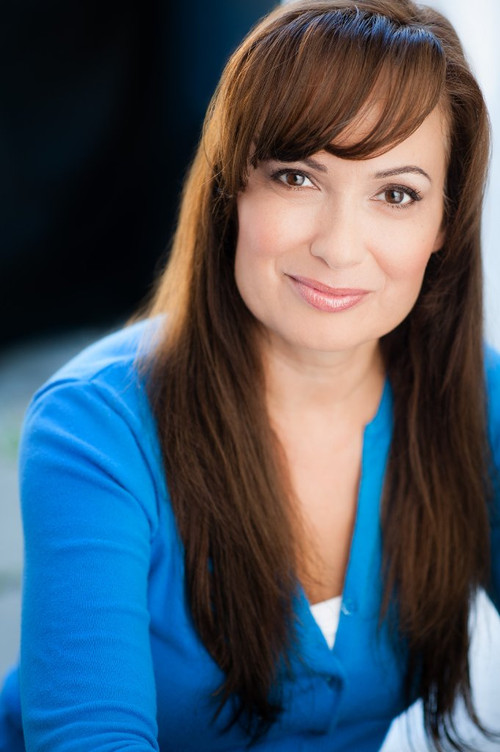 Ashley Michaels as Nora