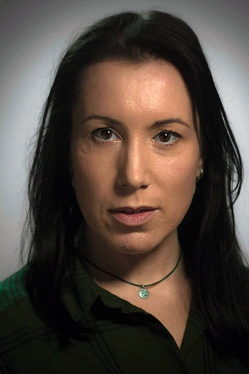 Sandra Howard-Williams as News Anchor