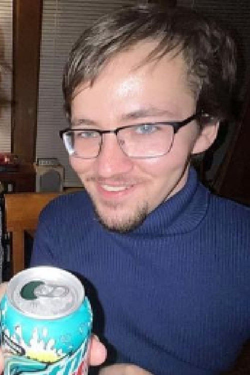 Sam Johnson as Blue Shirted Shopper