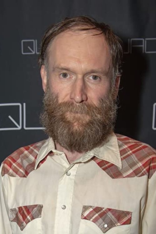 Mark Ashworth as Man (segment "American Hell")