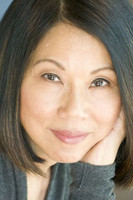 Marilyn Tokuda as Reporter (voice)