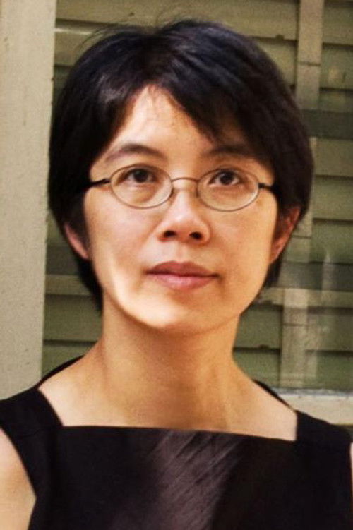 Ivy Ho as Toby's Press Conference MC