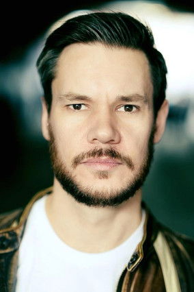 Jonathan Scholey as Roger