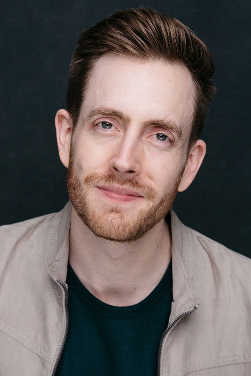 Jake D Williamson as Talk Show Host