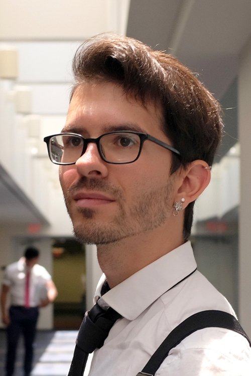 Aaron Pagniano as Yuppie on Bus