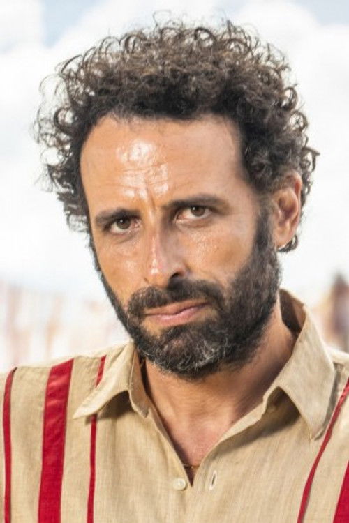César Ferrario as Zahym Attar