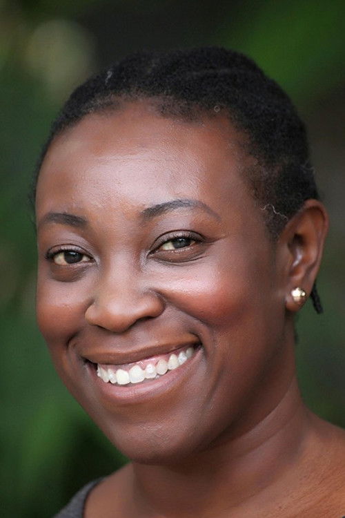 Asabi Goodman as Member of Public at Press Conference