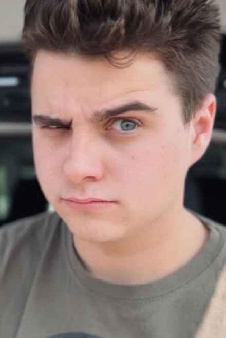 Tobin Davis as Background Walker