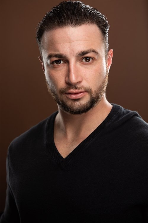 Jett Miller as Barber at the Building