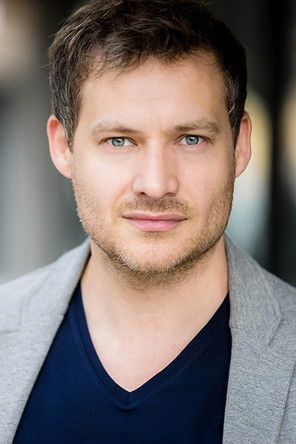 Rob Oldfield as Police Officer (voice)