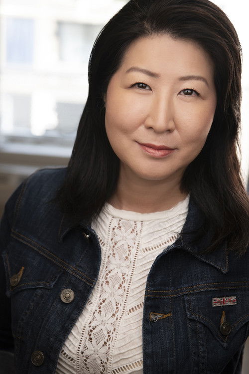 Lil Rhee as Office Worker