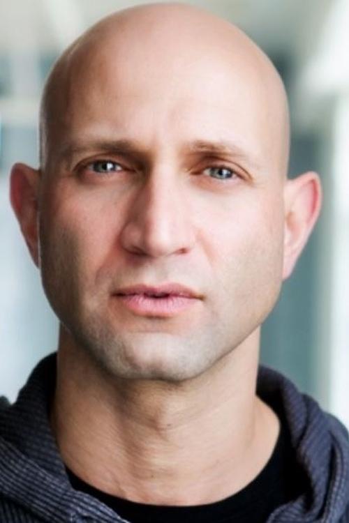 Jimmy Chimarios as Baraam Security Guard