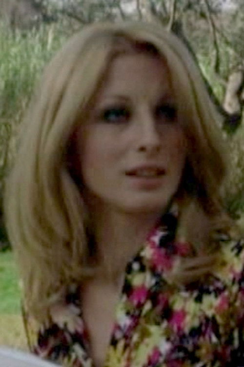 Erika Fisher as Girl in the car (opening scene)