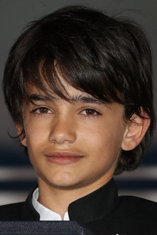 Zain Al Rafeea as Adam