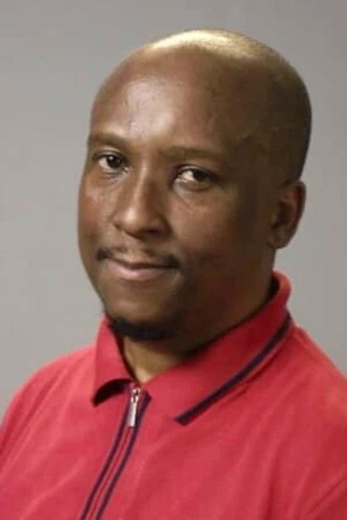 Bonginkosi Twala as Black Guy in Pub