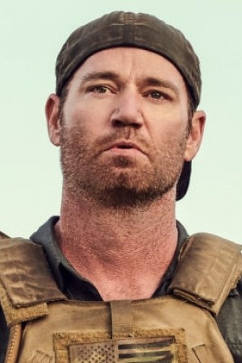 Scott Foxx as Travis Carter