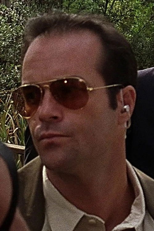 Mark Shelton as Office Executive