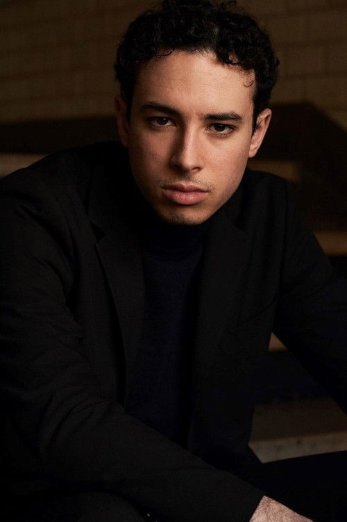 Fares Maouchi as Homme en photo sur le tableau