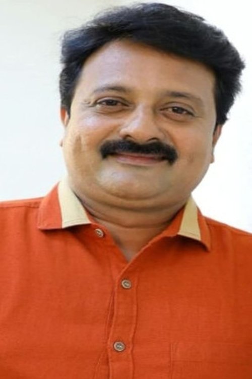 Rajesh Paravoor as Manoharan