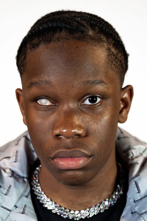 Mohamed-Lamine Cissé as Junior Rellys